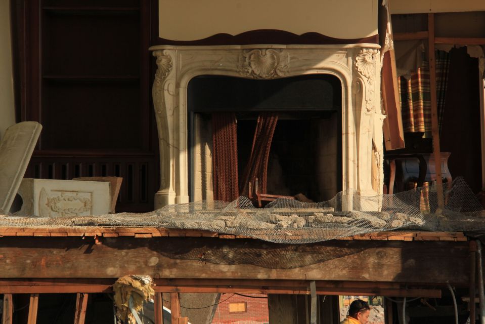 Exposed interior of damaged house on Rockaway Beach